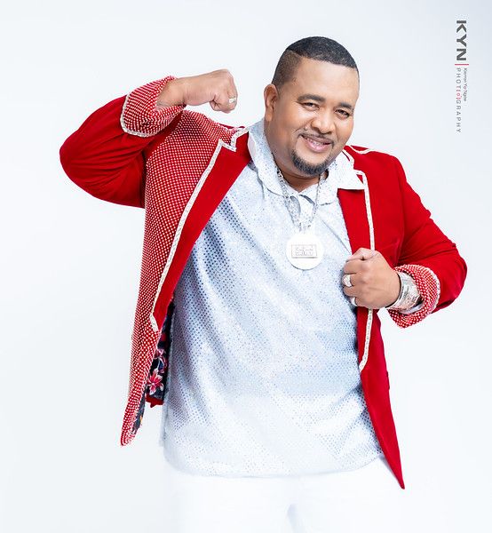 Daddy Chinee in his signature red jacket