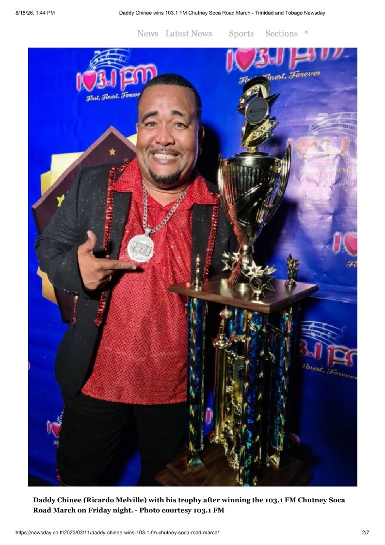 Daddy Chinee with his trophy after winning the 103.1 FM Chutney Soca Road March